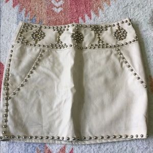 Faux leather studded skirt.